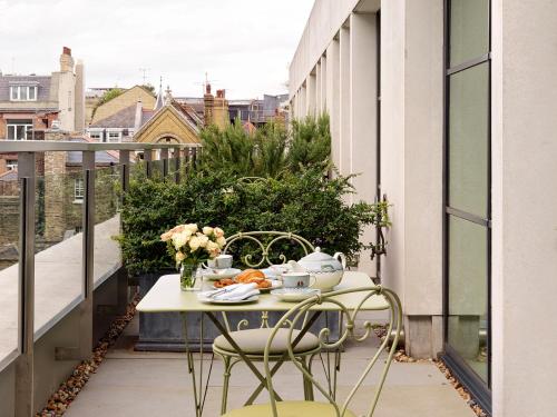 Habitación de lujo con terraza del hotel Ham Yard Hotel, Firmdale Hotels