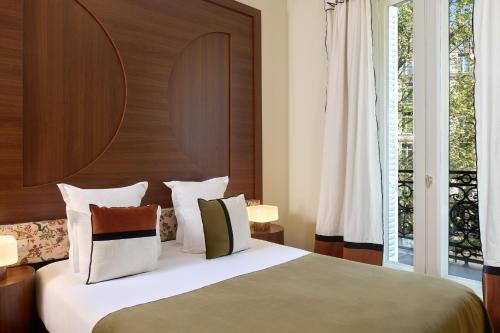Habitación doble con balcón del hotel D'argenson. Foto 1