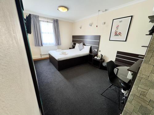 Habitación Doble adaptada para personas con movilidad reducida del hotel Epsilon. Foto 2