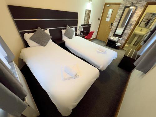 Habitación Familiar Deluxe del hotel Epsilon. Foto 1