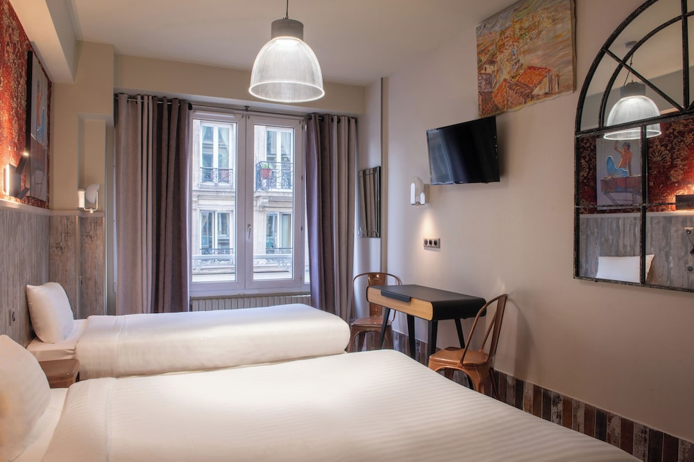 Habitación Triple del hotel De Roubaix. Foto 19