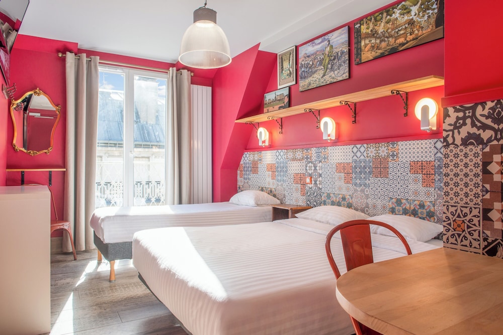 Habitación con 2 camas individuales del hotel De Roubaix. Foto 7