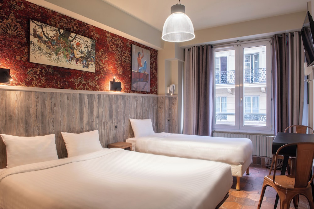 Habitación con 2 camas individuales del hotel De Roubaix. Foto 11