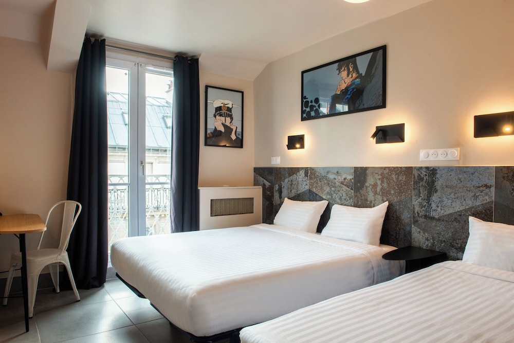 Habitación con 2 camas individuales del hotel De Roubaix. Foto 13