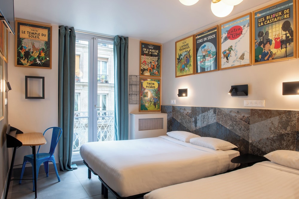 Habitación con 2 camas individuales del hotel De Roubaix. Foto 17