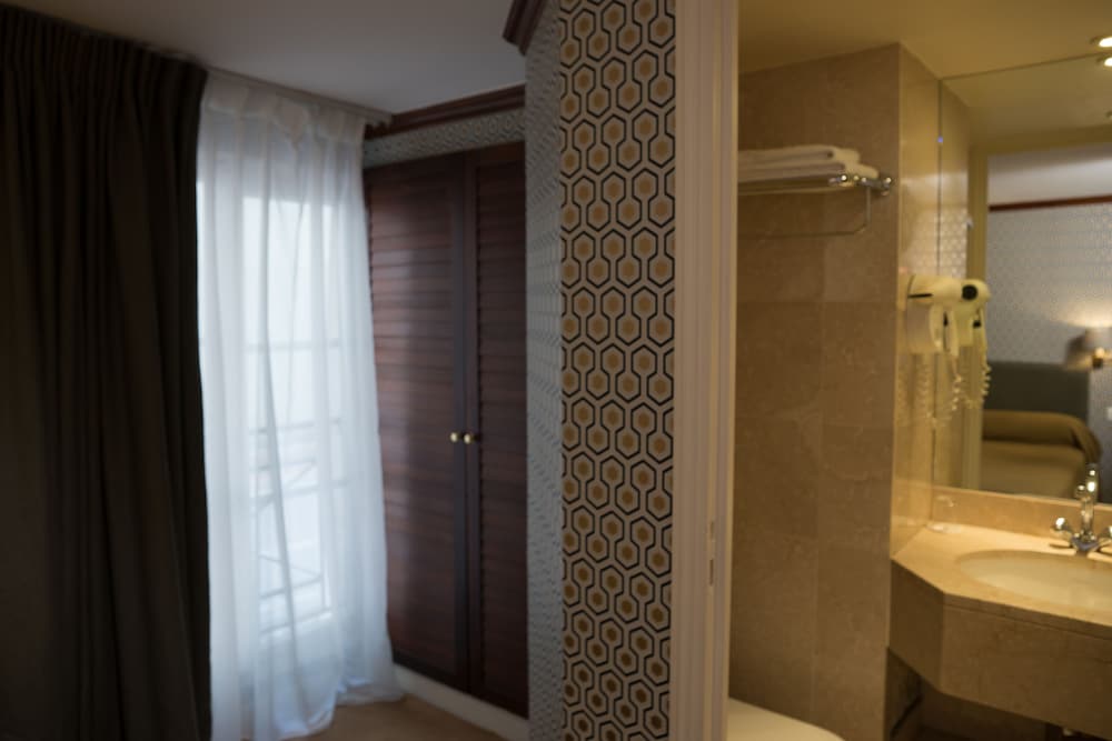 Habitación individual clásica, sin aire acondicionado del hotel Du Danube Saint Germain. Foto 4
