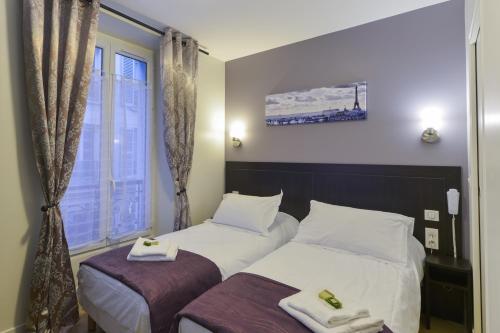 Habitación Doble - 2 camas del hotel Du Quai de Seine. Foto 3