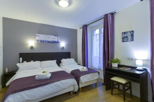 Habitación Triple del hotel Du Quai de Seine