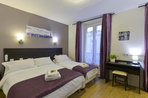 Habitación Triple del hotel Du Quai de Seine. Foto 4