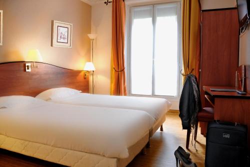 Habitación Doble Superior - 2 camas del hotel Eden Montmartre. Foto 3