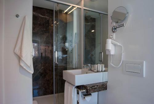 Estudio Interior 1 Cama queen Vista Patio kitchenette del hotel The 7