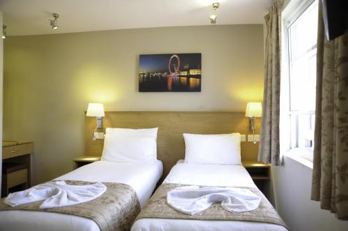 Habitación Doble - 2 camas del hotel Kings Cross Inn. Foto 4