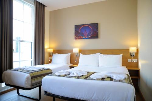 Habitación Triple del hotel Kings Cross Inn