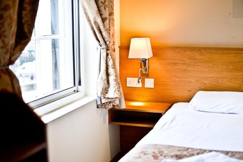 Habitación Triple del hotel Kings Cross Inn. Foto 3