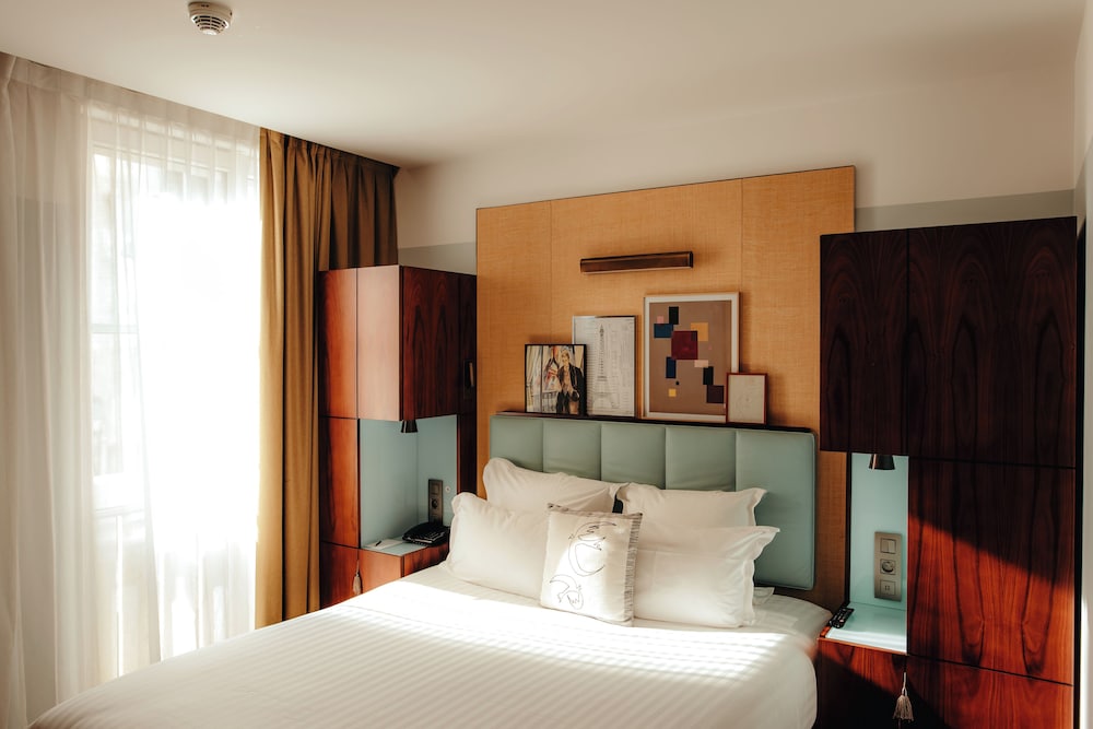 Habitación clásica, 2 habitaciones del hotel Eiffel Blomet. Foto 1