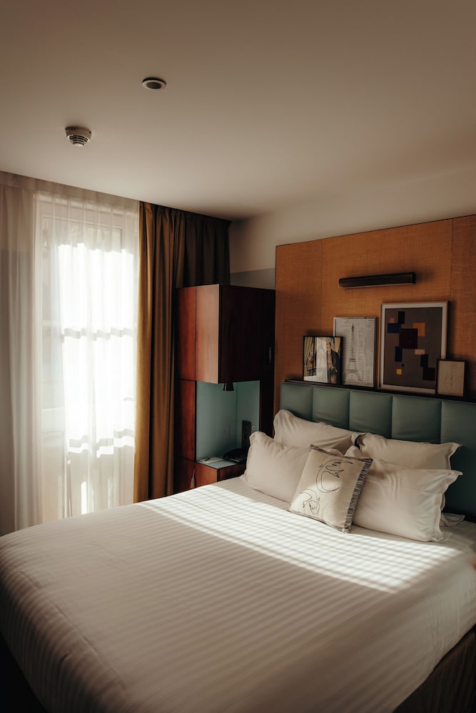 Habitación Doble Superior del hotel Eiffel Blomet. Foto 1
