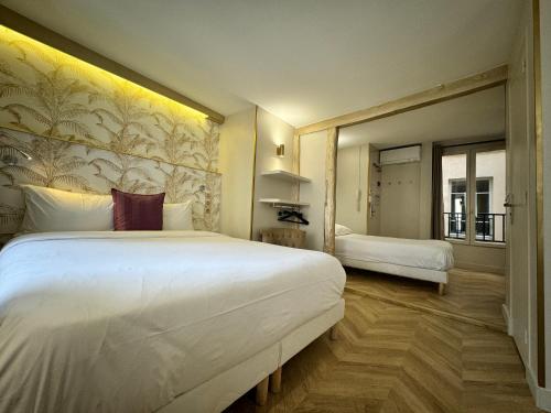 Habitación Triple Confort del hotel Nation Montmartre. Foto 4
