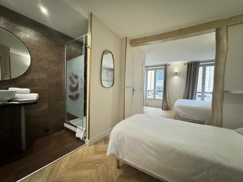 Habitación Triple Confort del hotel Nation Montmartre. Foto 6