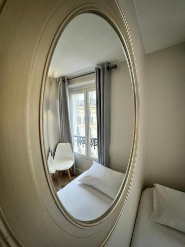 Habitación Triple Confort del hotel Nation Montmartre. Foto 7