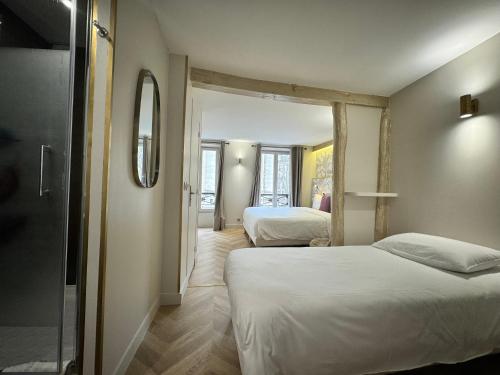 Habitación Triple Confort del hotel Nation Montmartre. Foto 8