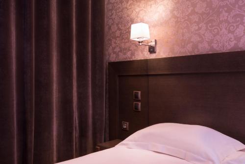 Habitación Doble Estándar situada en la planta baja del hotel Volney Opera. Foto 4