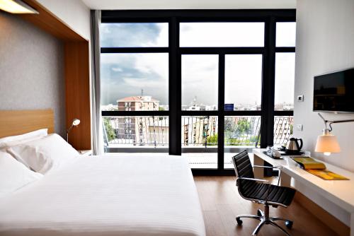 Suite Junior del hotel Hilton Garden Inn Milan North. Foto 1