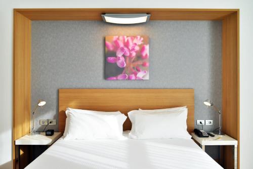 Habitación con cama extragrande - Adaptada para personas de movilidad reducida del hotel Hilton Garden Inn Milan North. Foto 1