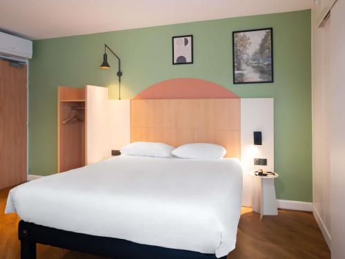 Habitación Standard accesible con 1 cama doble y 1 cama individual del hotel Ibis Marne La Vallée Val D'europe. Foto 2