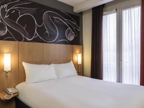 Habitación Doble Estándar del hotel Ibis Paris Vaugirard Porte De Versailles. Foto 2