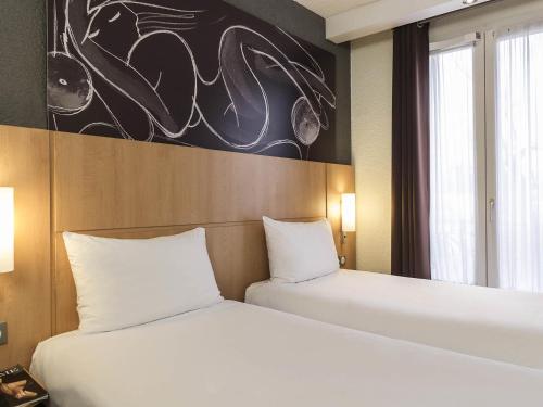 Habitación Estándar dos camas individuales del hotel Ibis Paris Vaugirard Porte De Versailles