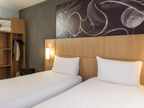 Habitación Estándar dos camas individuales del hotel Ibis Paris Vaugirard Porte De Versailles