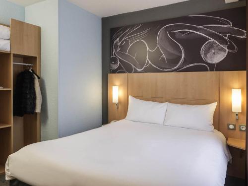 Habitación Doble Estándar del hotel Ibis Paris Vaugirard Porte De Versailles. Foto 7