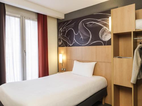 Habitación Individual Estándar del hotel Ibis Paris Vaugirard Porte De Versailles. Foto 1