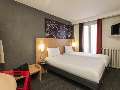 Habitación Estándar dos camas individuales del hotel Ibis Paris Vaugirard Porte De Versailles. Foto 2