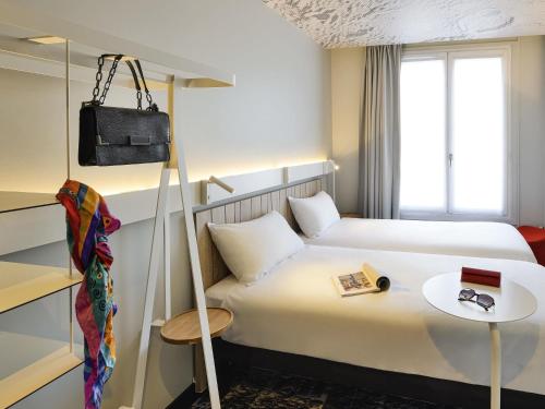 Habitación Doble Estándar - 2 camas del hotel ibis Paris Gare de L' Est 10ème. Foto 1