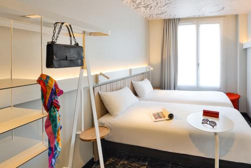 Habitación Doble Estándar - 2 camas del hotel ibis Paris Gare de L' Est 10ème. Foto 1
