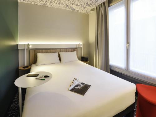 Habitación Doble Estándar del hotel ibis Paris Gare de L' Est 10ème. Foto 1