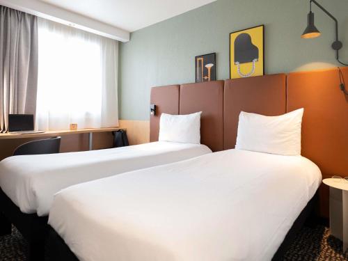 Habitación Doble Estándar - 2 camas del hotel Ibis Paris Gare De Lyon Ledru Rollin 12ème