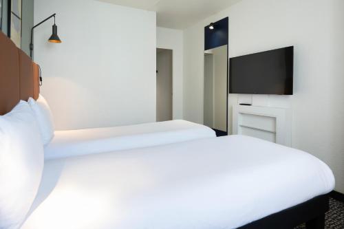 Dos habitaciones dobles no comunicadas del hotel Ibis Paris Gare De Lyon Ledru Rollin 12ème