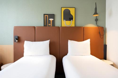 Dos habitaciones dobles no comunicadas del hotel Ibis Paris Gare De Lyon Ledru Rollin 12ème. Foto 3