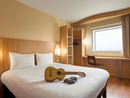 Habitación Doble Estándar del hotel Ibis Paris La Défense Esplanade. Foto 2