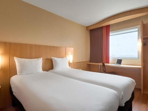 Habitación Estándar - 2 camas individuales del hotel Ibis Paris La Défense Esplanade. Foto 1