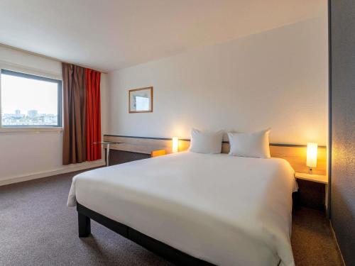 Habitación Doble Estándar del hotel Ibis Paris Pantin Eglise. Foto 2