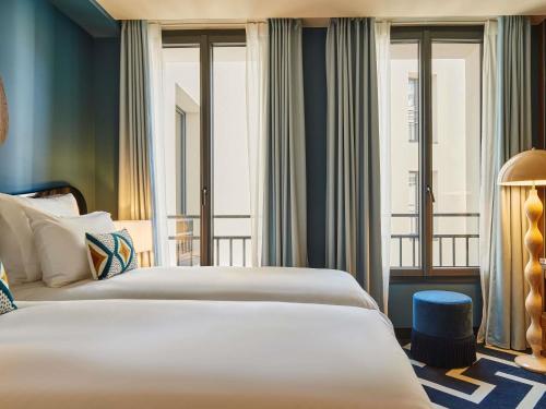 Habitación Doble Estándar - 2 camas del hotel Mercure Paris Butte Montmartre Basilique. Foto 2