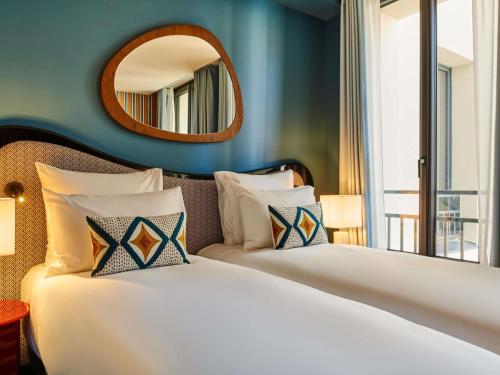 Habitación Doble Estándar - 2 camas del hotel Mercure Paris Butte Montmartre Basilique. Foto 2