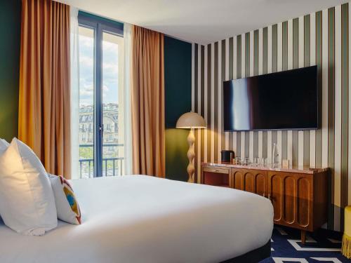Habitación Estándar - 1 cama grande del hotel Mercure Paris Butte Montmartre Basilique. Foto 7