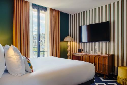 Habitación Estándar - 1 cama grande del hotel Mercure Paris Butte Montmartre Basilique. Foto 9