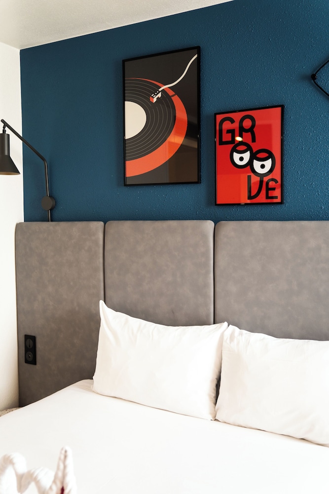 Habitación Standard con una cama doble del hotel Ibis Saint-denis Stade Ouest. Foto 4