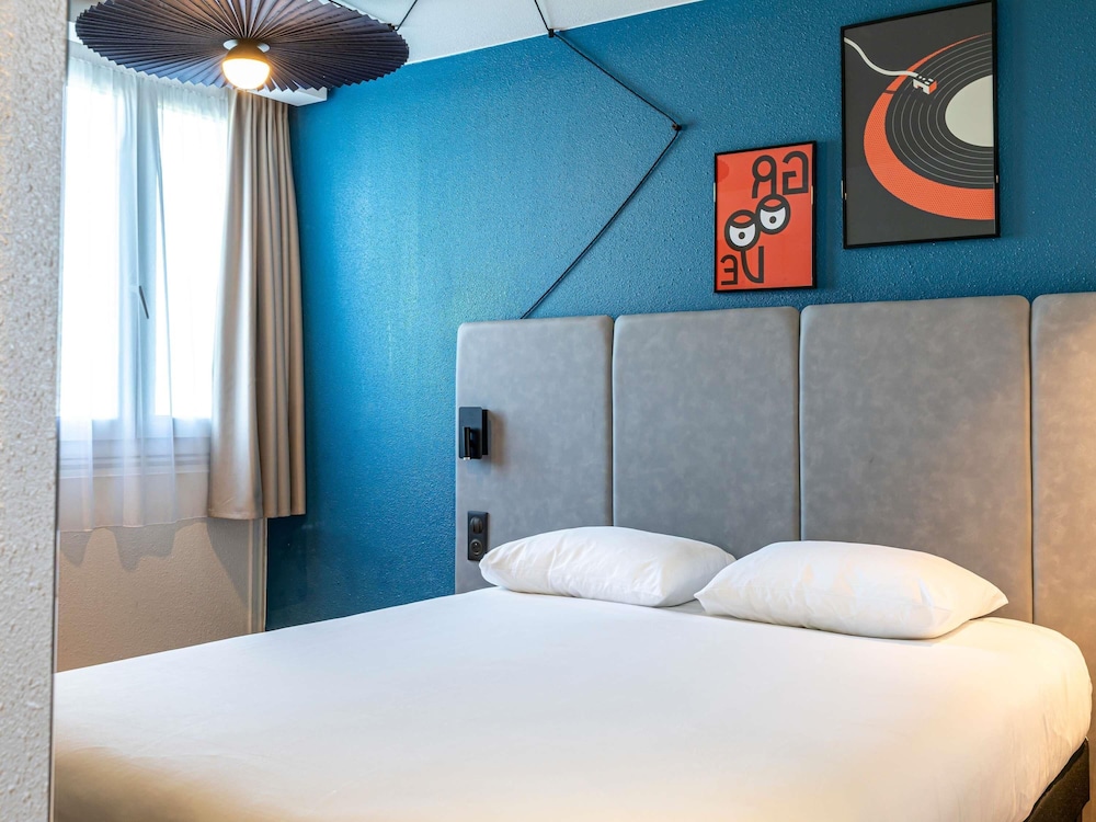 Habitación Standard con una cama doble del hotel Ibis Saint-denis Stade Ouest. Foto 5