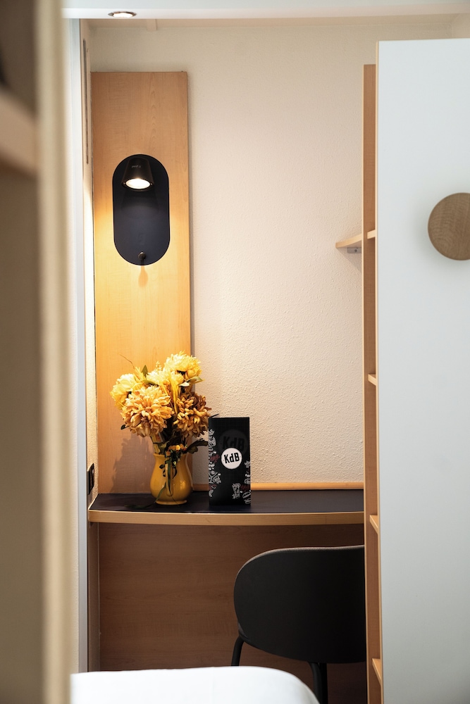 Habitación estándar 2 Camas individuales del hotel Ibis Saint-denis Stade Ouest. Foto 3